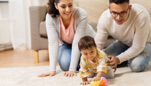 happy-family-and-baby-daugter-playing-at-home